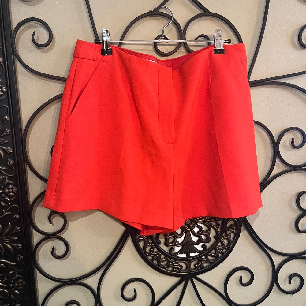 Trina Turk Orange Ladies shorts. Size 6.